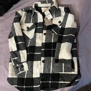 Black and white jacket from Thread Supply